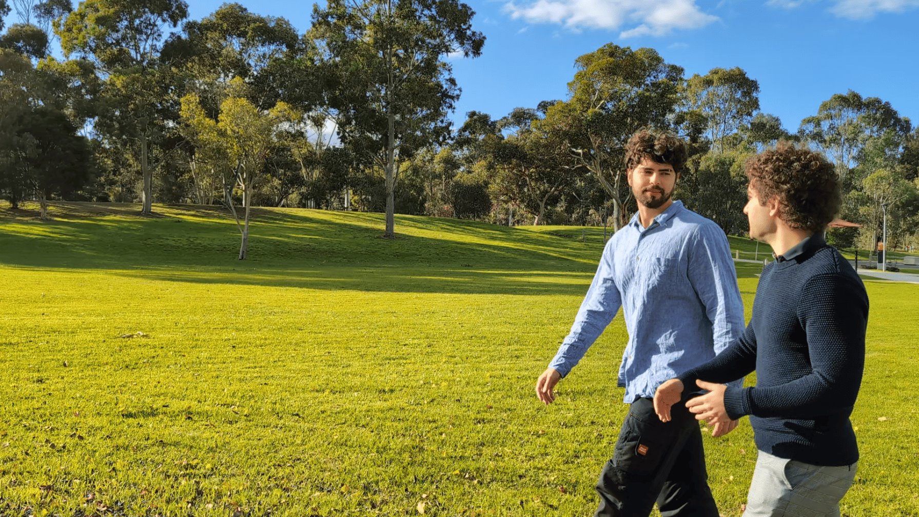 Matthew Rigoni Dietitian and Max Dennehy Dietitian walking in nature